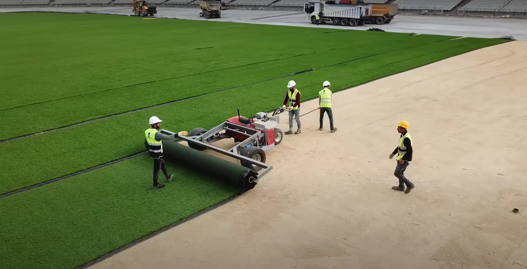 Turf carpet lay & seaming across the field