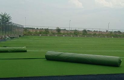 Turf carpet lay & seaming across the field